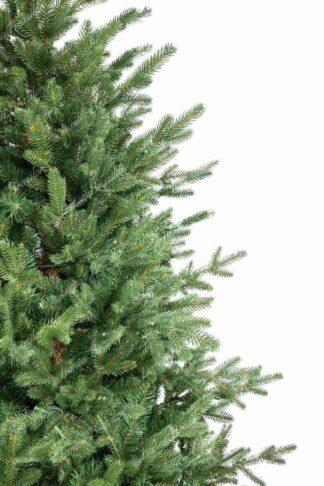 Detaliu al bradului artificial de Crăciun 3D Molid Estonian, Are crengi dese, de culoare verde, iar bradul are un trunchi maro